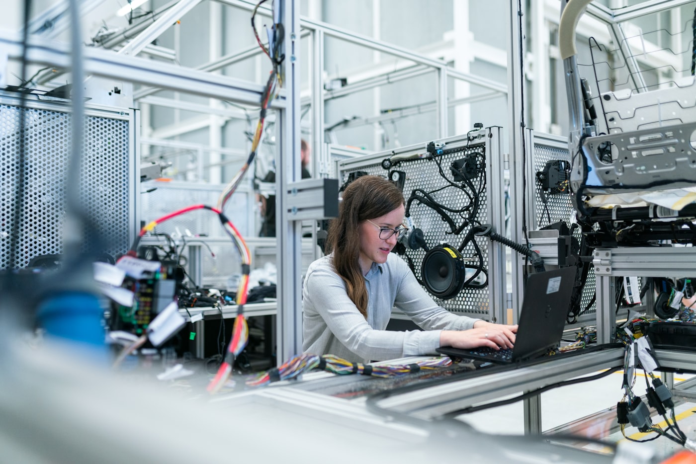 Engineer working with electrical systems in a technical lab